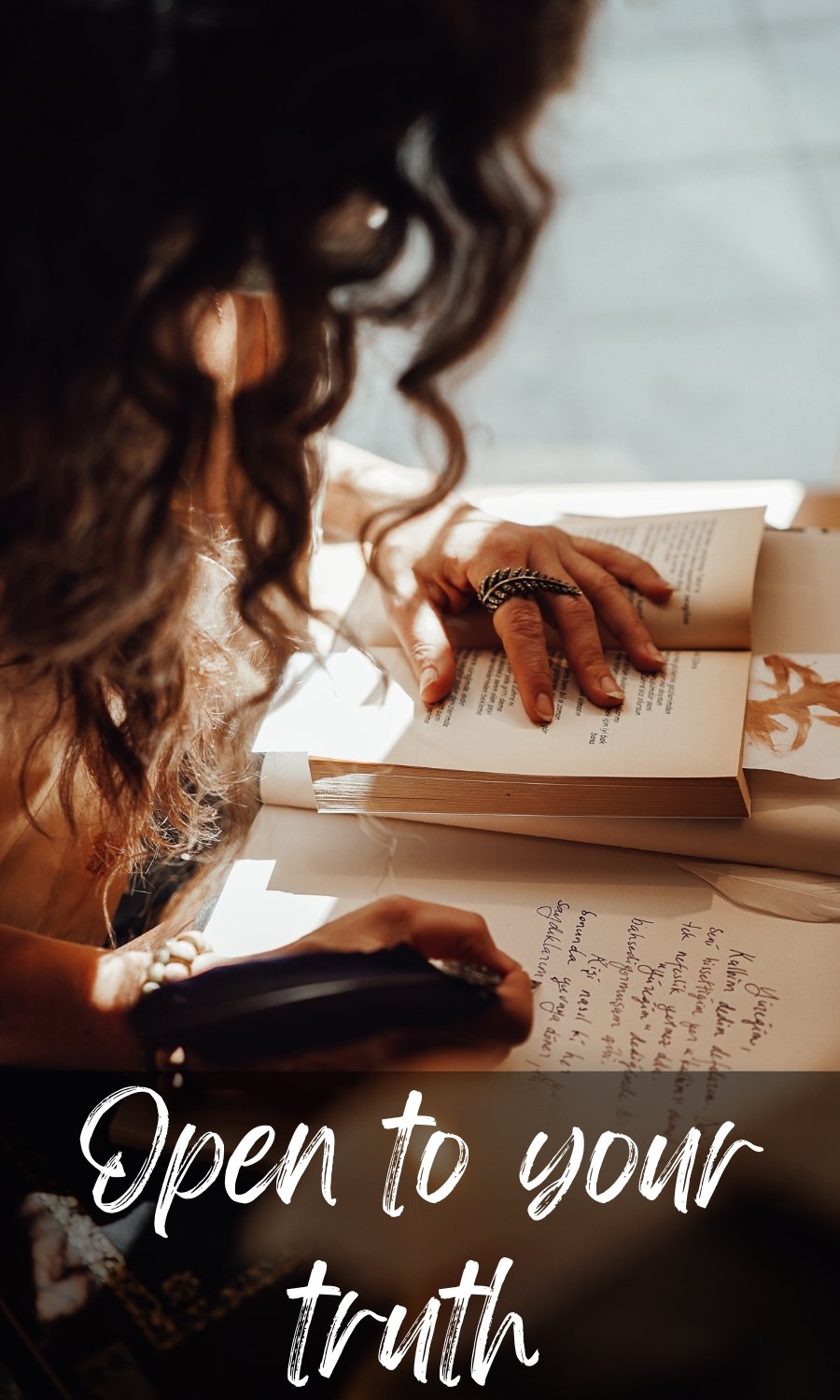 Woman journaling by hand, pen to paper, opening up to her own truth